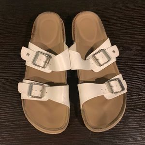 White buckled sandals